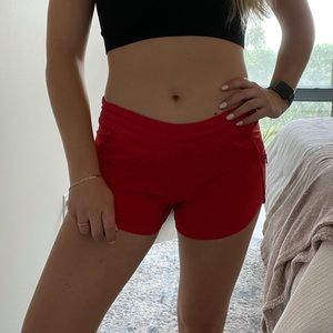 Red lululemon run shorts